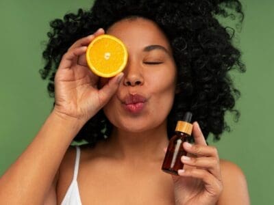 portrait young beautiful woman with citrus vitamin c serum 23 2150331759